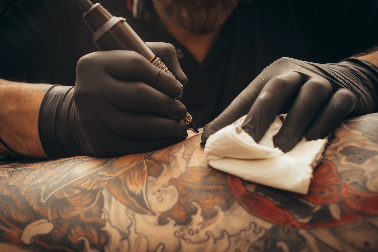 Close up of the tattoo machine. Tattooing.